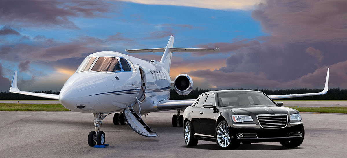 a luxury car standing with private plane